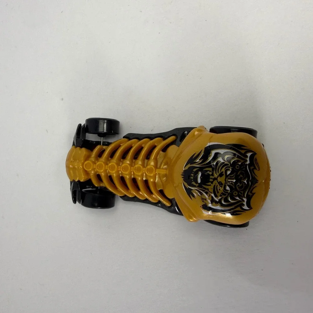 Hot Wheels Skull Crusher 2009 Mattel Gold Black Skeleton Diecast Car 1:64 Scale